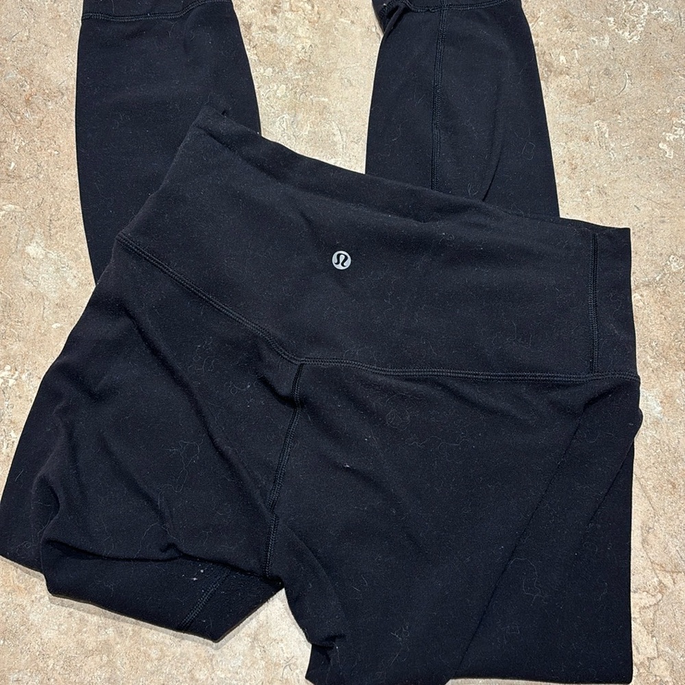 Black Lululemon align leggings. Very well loved and worn.